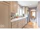 Beautiful kitchen featuring stone counters, stainless appliances, and modern cabinetry at 445 N 13Th Ave, Beech Grove, IN 46107