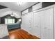 View of a bedroom with multiple closets and an area with a bed that has a sloped ceiling at 5312 E Southern Ave, Indianapolis, IN 46203