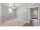 Cozy bedroom with neutral carpet and a modern light fixture, creating a peaceful retreat at 5312 E Southern Ave, Indianapolis, IN 46203