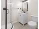 Updated bathroom with white vanity, tiled shower, and modern fixtures offers a clean, contemporary feel at 5422 Orange St, Indianapolis, IN 46203