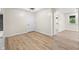 Empty living room with beautiful flooring and natural light at 5422 Orange St, Indianapolis, IN 46203