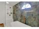 Elegant bathroom featuring a soaking tub, walk-in shower, and sophisticated design at 545 Walnut Woods Dr, Greenwood, IN 46142