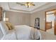 Relaxing bedroom with neutral tones, soft bedding, and a charming decor at 545 Walnut Woods Dr, Greenwood, IN 46142