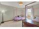 Bright bedroom with four poster bed and natural light at 545 Walnut Woods Dr, Greenwood, IN 46142