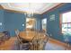 Inviting dining room featuring a wooden table, chandelier, and view of the kitchen at 545 Walnut Woods Dr, Greenwood, IN 46142