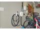 Residential garage features an electric car charger and tool storage at 545 Walnut Woods Dr, Greenwood, IN 46142