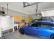 View of residential garage featuring shower, shelving, and parking at 545 Walnut Woods Dr, Greenwood, IN 46142