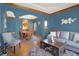 Open-concept living and dining area with hardwood floors and plenty of natural light at 545 Walnut Woods Dr, Greenwood, IN 46142