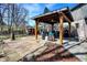 Comfortable backyard patio with covered gazebo and outdoor seating at 545 Walnut Woods Dr, Greenwood, IN 46142