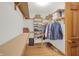 Spacious walk-in closet with ample shelving and wooden floors at 545 Walnut Woods Dr, Greenwood, IN 46142