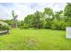 Lush green backyard providing ample space for outdoor activities and relaxation at 5558 Bertha St, Indianapolis, IN 46241