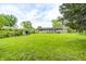 Large backyard featuring a well-maintained lawn, perfect for recreation and relaxation at 5558 Bertha St, Indianapolis, IN 46241