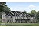 New construction townhome featuring gray siding, black roofing and trim and brick facade at 5790 Arcade Blvd, McCordsville, IN 46055