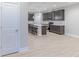 Beautiful kitchen with stainless steel appliances, gray cabinetry, and a central island with seating at 5790 Arcade Blvd, McCordsville, IN 46055
