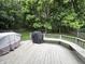 This back deck has a bench, grill, and ample space for entertaining Gathering and friends at 6366 Stratford N Dr, Fishers, IN 46038