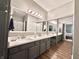 Elegant bathroom with dual sinks, spacious vanity, and updated fixtures at 6366 Stratford N Dr, Fishers, IN 46038