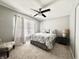 Cozy bedroom with neutral decor, and soft natural lighting at 6366 Stratford N Dr, Fishers, IN 46038