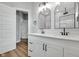 Elegant bathroom with double vanity, modern fixtures, and ample counter space at 637 N Quartz Ln, Fortville, IN 46040