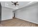 Spacious bedroom featuring wood flooring and a trey ceiling with fan at 637 N Quartz Ln, Fortville, IN 46040