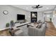 Comfortable living room features stylish decor, a fireplace, and neutral color palette for a relaxing ambiance at 637 N Quartz Ln, Fortville, IN 46040