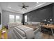 Beautiful main bedroom features decorative wall, a ceiling fan and a view of the lake at 637 N Quartz Ln, Fortville, IN 46040