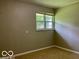 Empty bedroom featuring carpet and a bright window at 6373 E Hadley Rd, Mooresville, IN 46158