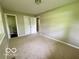Spacious bedroom featuring carpet and a closet at 6373 E Hadley Rd, Mooresville, IN 46158