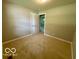 Empty bedroom with neutral walls, carpet and a ceiling light at 6373 E Hadley Rd, Mooresville, IN 46158
