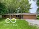 Charming single story brick home with a mature trees and a well-maintained lawn at 6373 E Hadley Rd, Mooresville, IN 46158
