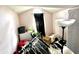 Attic bedroom with sloping ceilings, natural light, and ample space for storage and décor at 6640 Sundown S Dr, Indianapolis, IN 46254