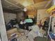 Cluttered garage space offering potential for storage and organization at 6640 Sundown S Dr, Indianapolis, IN 46254