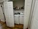 Laundry room features a washer and dryer conveniently located behind bi-fold doors at 6640 Sundown S Dr, Indianapolis, IN 46254