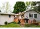 Backyard view of a home with a multi-level deck perfect for outdoor entertaining and relaxation at 6799 Lakeshore Dr, Avon, IN 46123