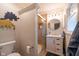 This beautiful bathroom features vertical molding, a neutral color palette, and an updated vanity at 6799 Lakeshore Dr, Avon, IN 46123