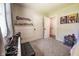 Well-lit bedroom featuring built-in storage, carpet, and a window creating a cozy and functional space at 6799 Lakeshore Dr, Avon, IN 46123