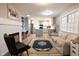 Open-concept kitchen and living room area with a fireplace and comfortable seating at 6799 Lakeshore Dr, Avon, IN 46123