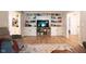 Spacious living room showcasing built-in bookshelves and a cozy seating area at 6799 Lakeshore Dr, Avon, IN 46123