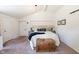 Serene main bedroom featuring bright walls, vaulted ceiling, and natural light at 6799 Lakeshore Dr, Avon, IN 46123