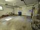 Spacious garage with dual overhead doors, ample storage, and a clean, organized layout at 7015 Westlake Rd, Indianapolis, IN 46214