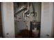 Basement mechanical room showing a water heater and HVAC unit at 708 Mountain Pine Dr, Greenwood, IN 46143