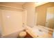 Clean bathroom featuring a shower-tub combo and a vanity sink with a mirror at 708 Mountain Pine Dr, Greenwood, IN 46143
