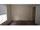 Bedroom featuring carpet flooring, window, and closet with sliding doors at 708 Mountain Pine Dr, Greenwood, IN 46143