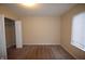 Neutral bedroom with carpet flooring, closet, and natural light at 708 Mountain Pine Dr, Greenwood, IN 46143