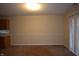 Dining room area with sliding glass doors, neutral paint and carpet at 708 Mountain Pine Dr, Greenwood, IN 46143