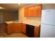 Well-lit kitchen offering wood cabinets, updated countertops, and a black dishwasher at 708 Mountain Pine Dr, Greenwood, IN 46143