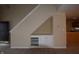 Open living room with neutral walls and built in shelves and cabinets at 708 Mountain Pine Dr, Greenwood, IN 46143