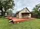 Inviting backyard featuring a spacious deck, perfect for enjoying the outdoors and entertaining guests at 710 Bacon St, Indianapolis, IN 46227
