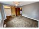 Bedroom featuring neutral walls, closet, and view to laundry area at 710 Bacon St, Indianapolis, IN 46227