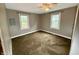 Bedroom featuring neutral walls, and dual-pane windows at 710 Bacon St, Indianapolis, IN 46227