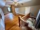 Spacious bonus room with hardwood floors and ceiling fan at 710 Bacon St, Indianapolis, IN 46227